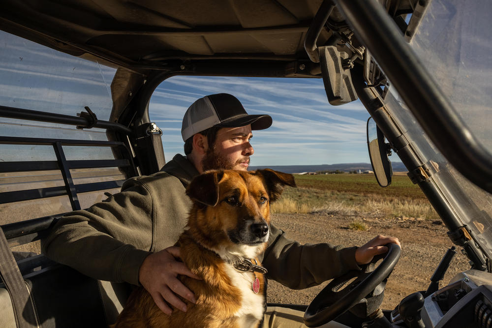 Landan Wilson drives to check on his farm.