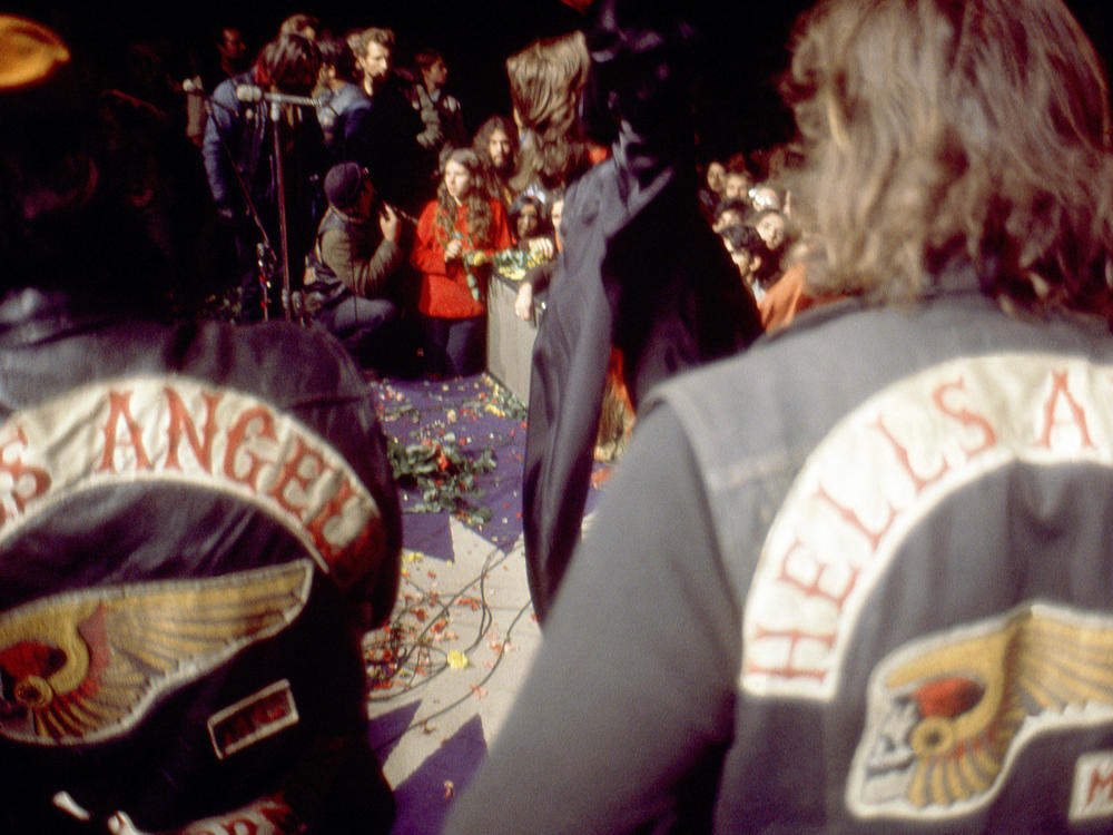 Mick Jagger performs with The Rolling Stones as Hell's Angels guard the stage, during the Altamont Speedway Free Festival on Dec. 6, 1969 at the Altamont Speedway near Tracy, Calif.