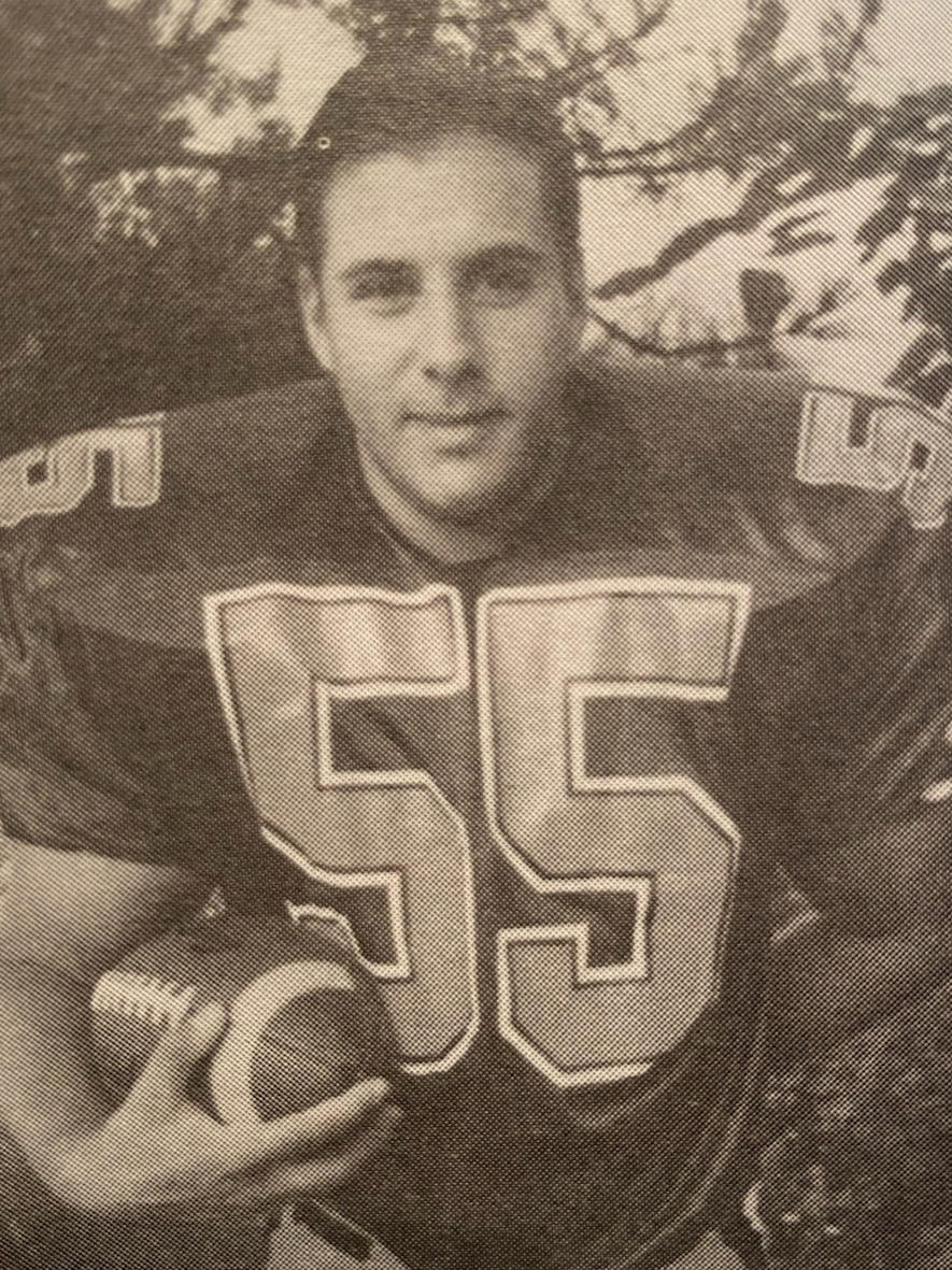 A photo of T.J. Abraham when he was on his high school football team. He played from fourth grade through college at Division I Duquesne University.