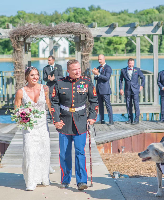 Hanah and Nick walk down the aisle on their wedding day, Sept. 5, 2020. Nick was prescribed pain medication and antidepressants but didn't take them that day, so he could be emotionally present throughout the day.