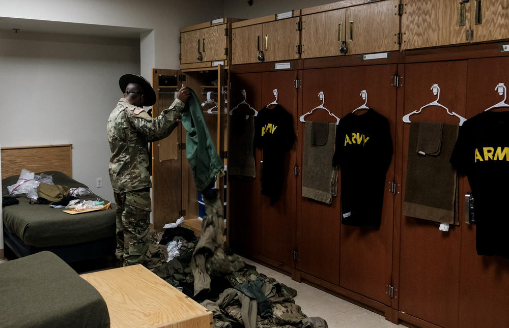 Sr. Drill Sgt. Justin Geiger conducts a room inspection at Fort Meade.