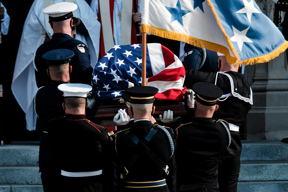Members of the Honor Guard carry the casket of the retired Army general, and former secretary of state during funeral services at the National Cathedral in Washington, D.C., on Nov. 5, 2021.