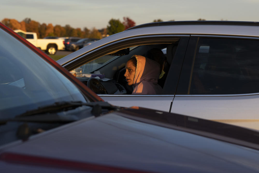 Veronica Vargas drives her children to the park's restroom.