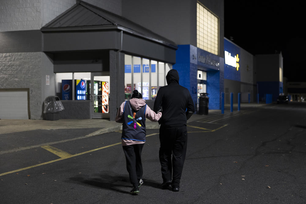 Vargas and Alex head into Walmart for their nightly shift.