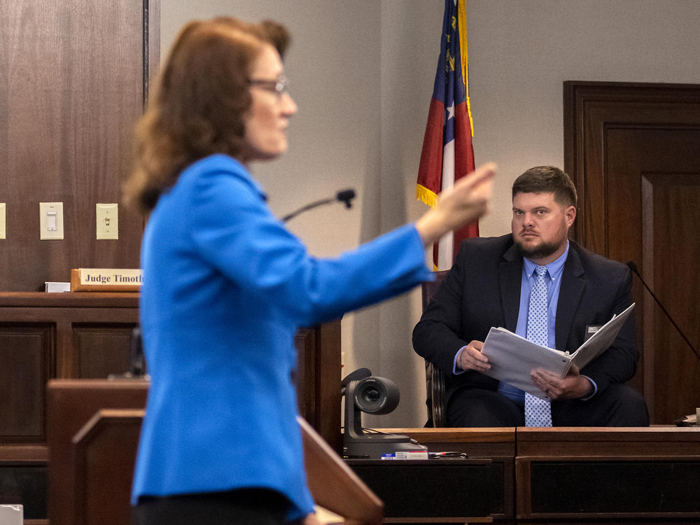 Glynn County Police Department Investigative Detective Parker Marcy is questioned by prosecutor Linda Dunikoski about his investigation.