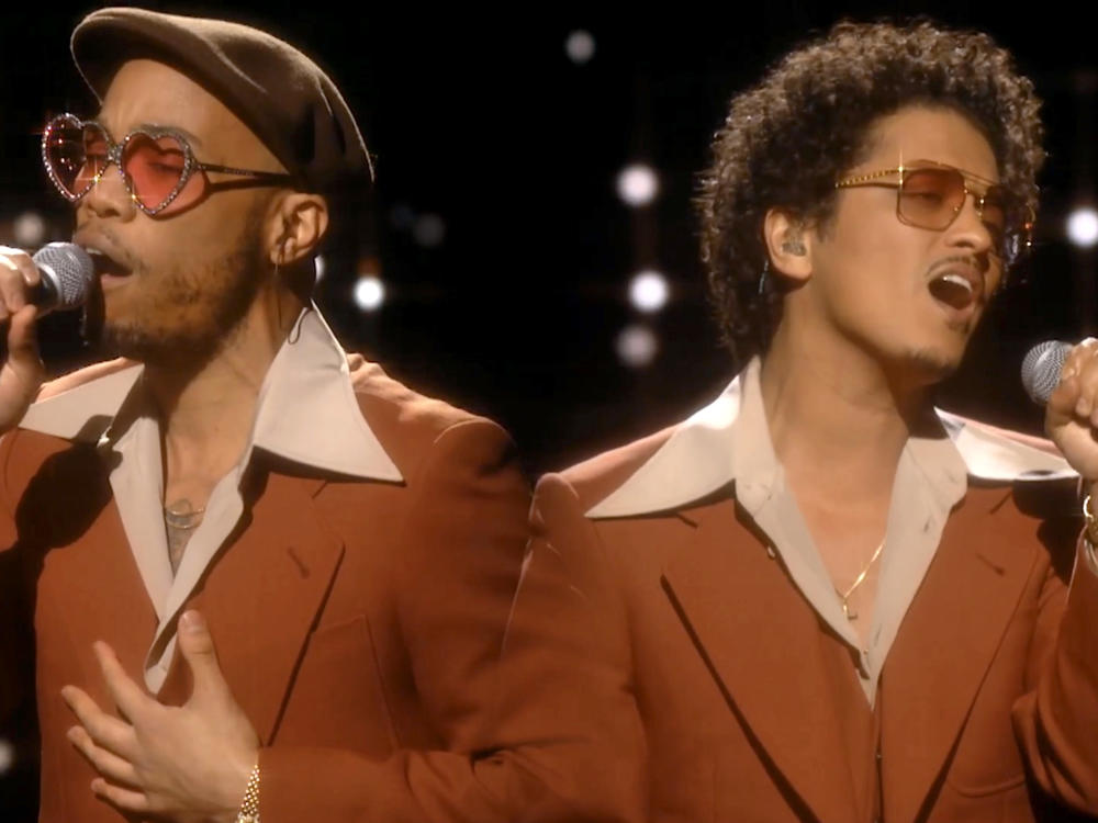Anderson .Paak and Bruno Mars perform as Silk Sonic during the 2021 Grammy Awards broadcast.