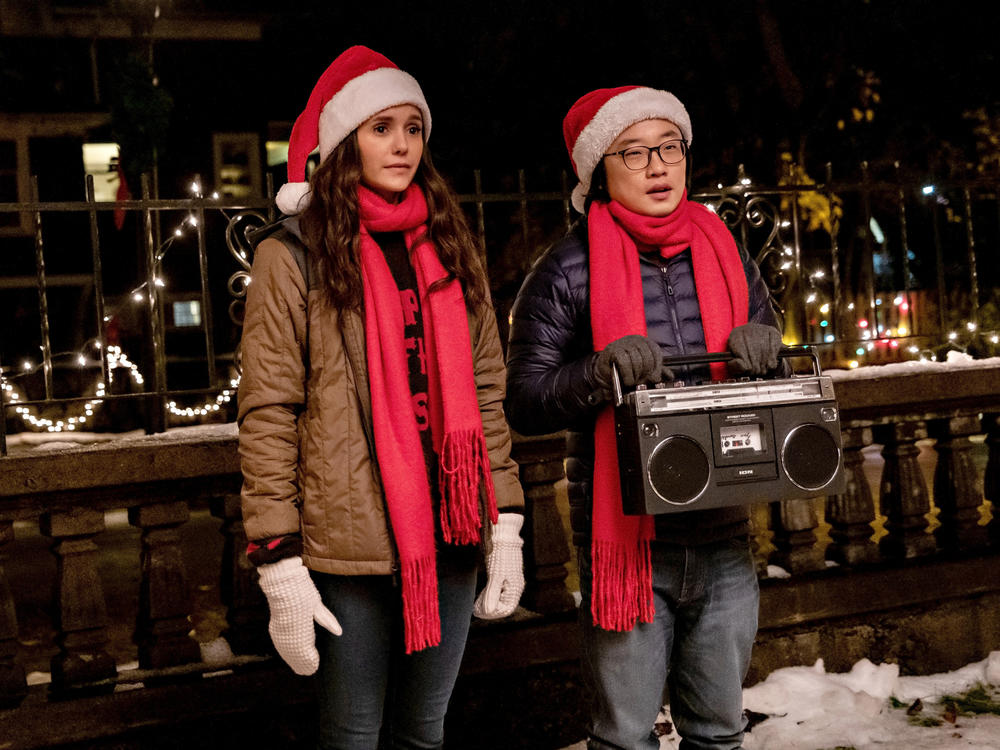 Nina Dobrev and Jimmy O. Yang in <em>Love Hard</em>.