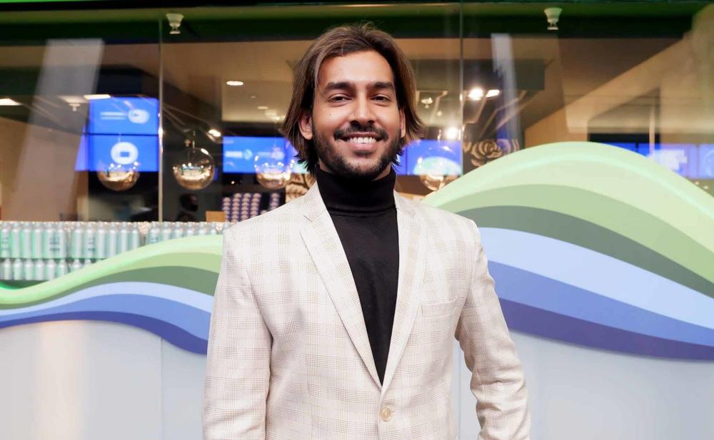 Climate activist Raeed Ali from Fiji, seen here at COP26, is pushing wealthier countries to compensate for climate change losses, like villages being relocated in his country due to rising seas.