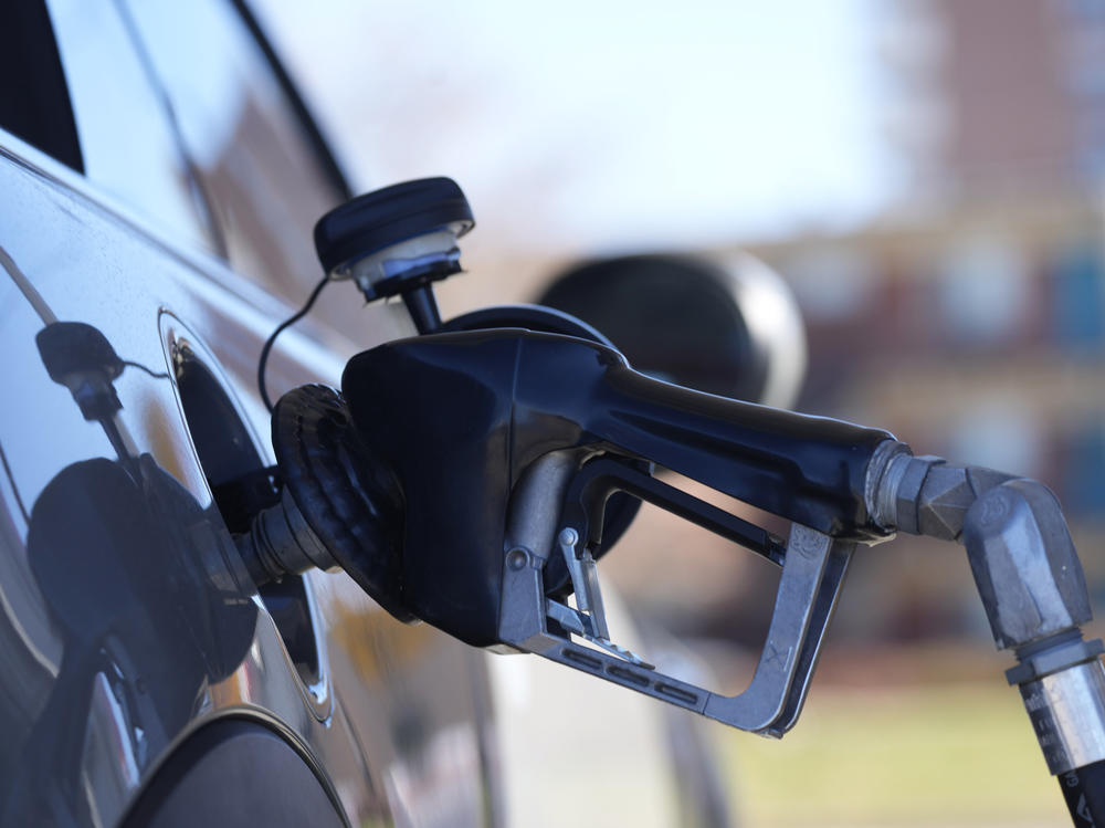 A motorist fills a vehicle with gasoline at a Shell station on Nov. 5 in Denver. Energy prices are among the biggest drivers of inflation.