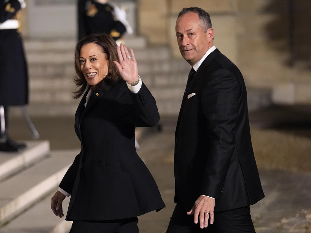 Vice President Harris and her husband Douglas Emhoff arrive for a dinner at the Elysee Palace as part of the Paris Peace Forum.
