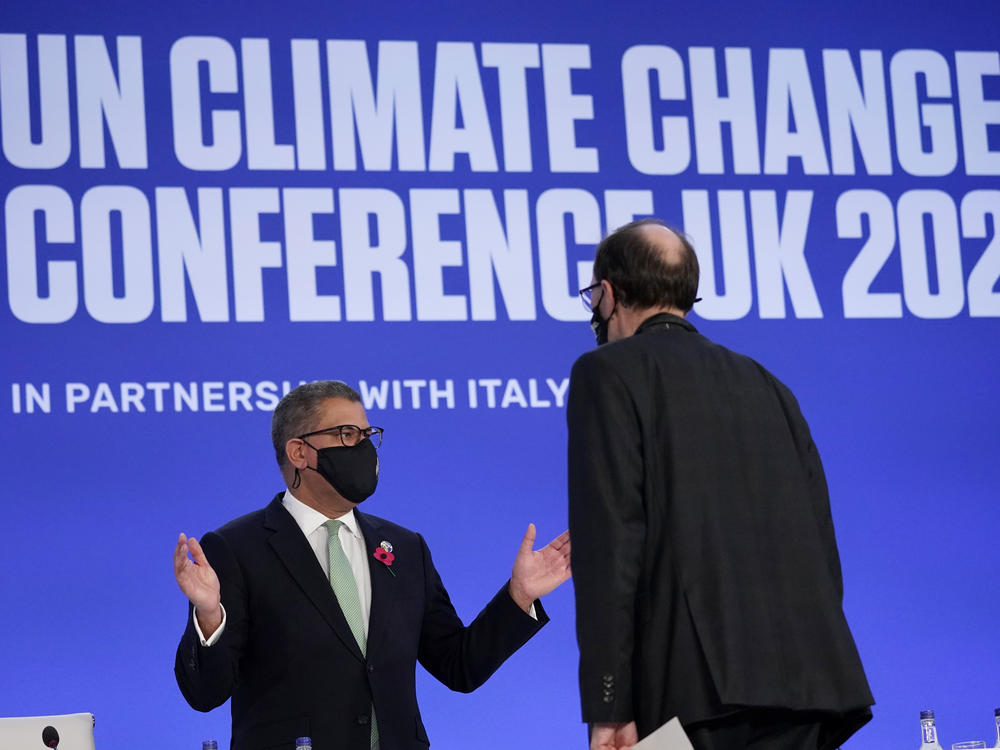 Alok Sharma (left), president of the COP26 summit, attends a stocktaking plenary session in Glasgow, Scotland, on Saturday.