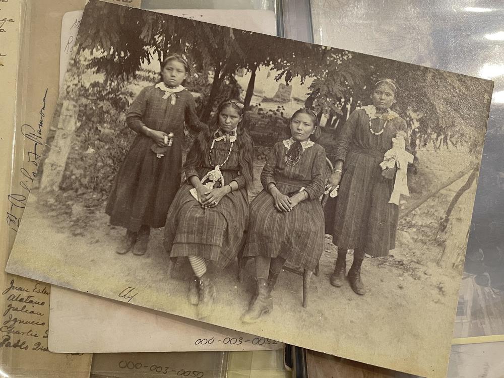 An archival photo from the Center for Southwest Research at the University of New Mexico in Albuquerque, shows a group of unidentified Indigenous students who attended the Ramona Industrial School in Santa Fe.