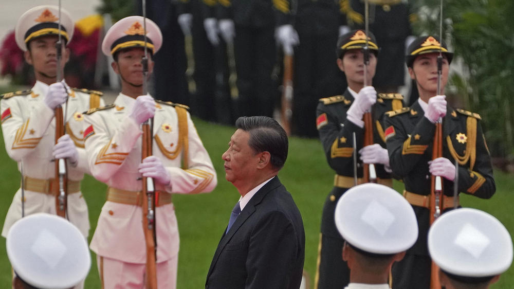 Chinese President Xi Jinping walks past an honor guard in Beijing in September. The U.S. intelligence community, along with other parts of the national security establishment, are increasingly focused on China as the main U.S. competitor.