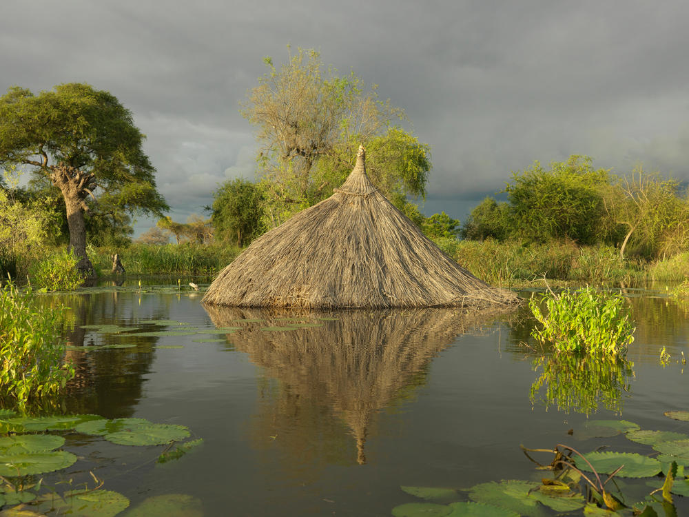 A home submerged in floodwater near the village of Paguir. (September 2021)