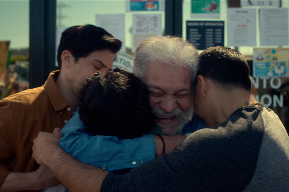 (L-R) Carlos Santos as Chris, Joaqui­n Cosio as Pop, and J.J. Soria as Erik in <em>Gentefied</em>.