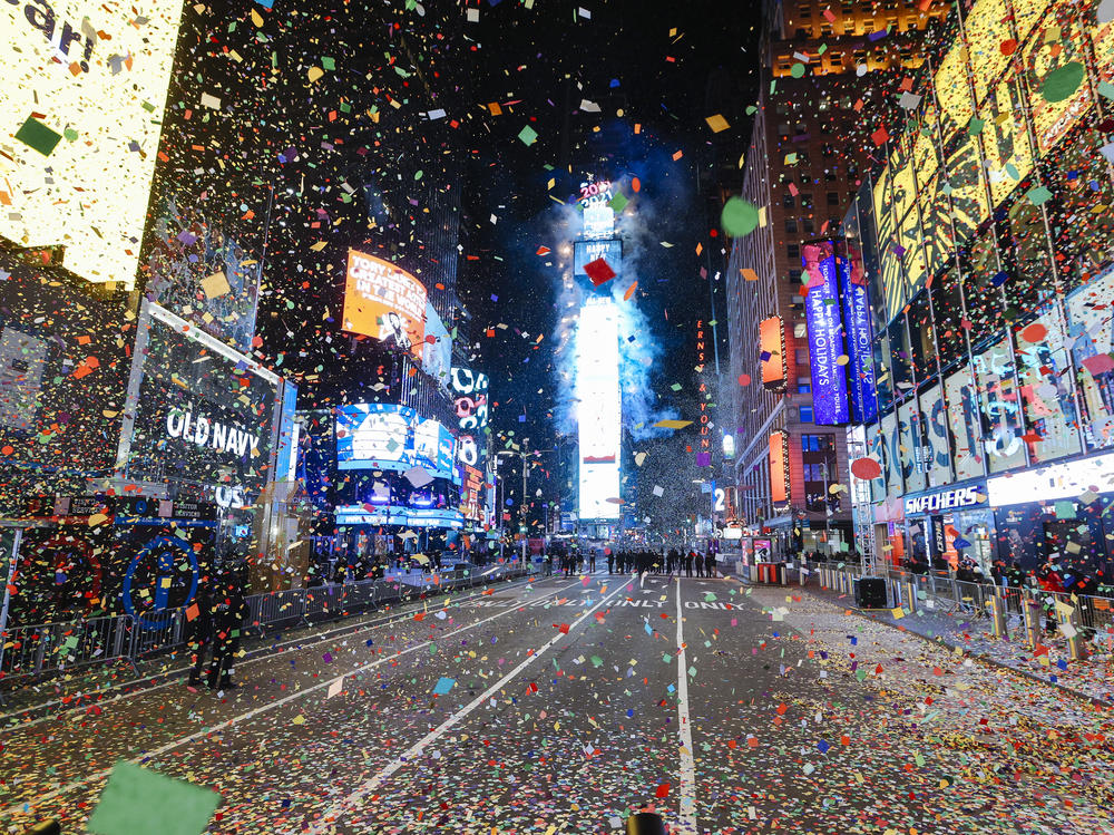 Confetti falls at midnight during a virtual New Year's Eve celebration in New York City's Times Square on Jan. 1, 2021. The annual New Year's Eve ball drop event, which typically draws more than 1 million people, was closed to the public due to the COVID-19 risk.