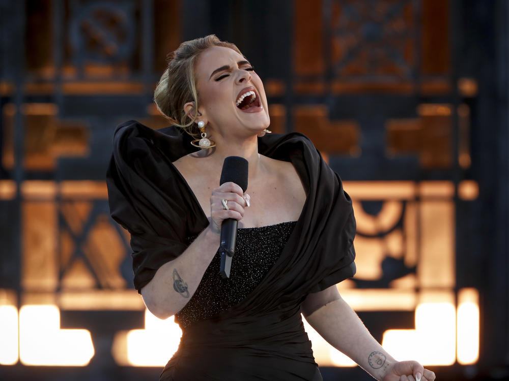 Adele sings in front of Griffith Observatory in Los Angeles during a televised concert to promote her fourth album, <em>30</em>, which chronicles the aftermath of her divorce in ways that take subtle chances with the star's signature cathartic style.