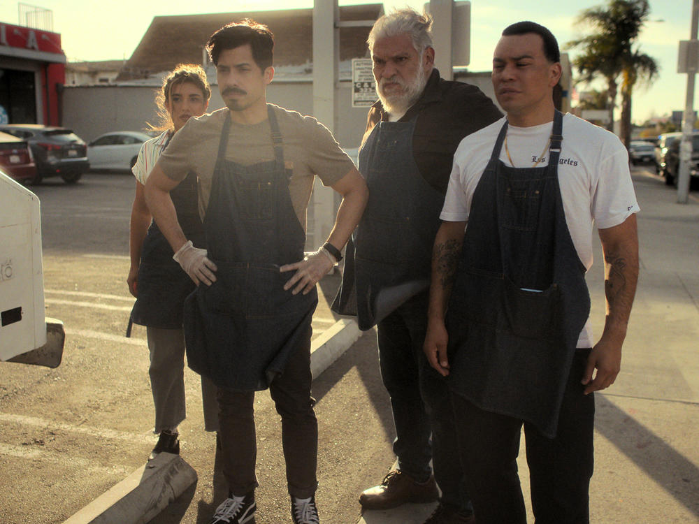 Ivana Rojas as Sarai, Carlos Santos as Chris, Joaquin Cosio as Pop, and J.J. Soria as Erik.