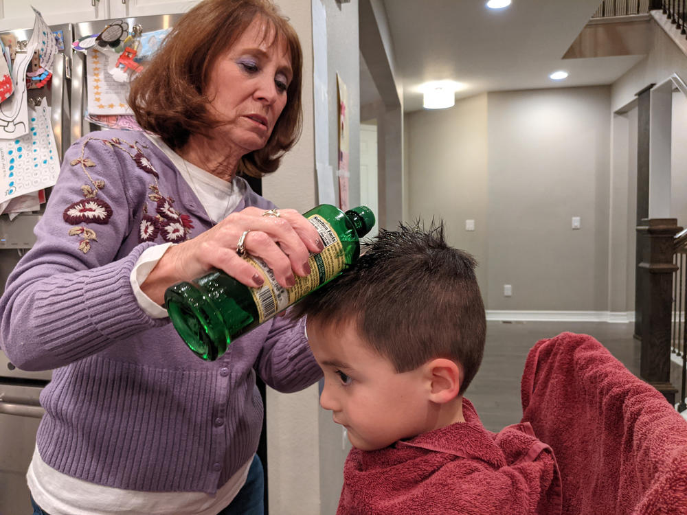LiceDoctors technician Linda Holmes checks the heads of everyone in the Marker family for lice, including preschooler Hudson. It cost more than $200 to get the four-person household checked — eyebrows and Dad's beard included.