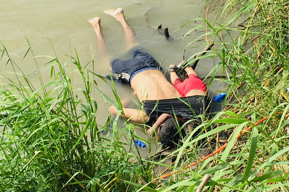 The bodies of Salvadoran migrant Oscar Alberto Martínez Ramírez and his nearly 2-year-old daughter Valeria lie on the bank of the Rio Grande in Matamoros, Mexico, on June 24, 2019, after they drowned trying to cross the river to Brownsville, Texas. Martinez' wife, Tania told Mexican authorities she watched her husband and child disappear in the strong current.