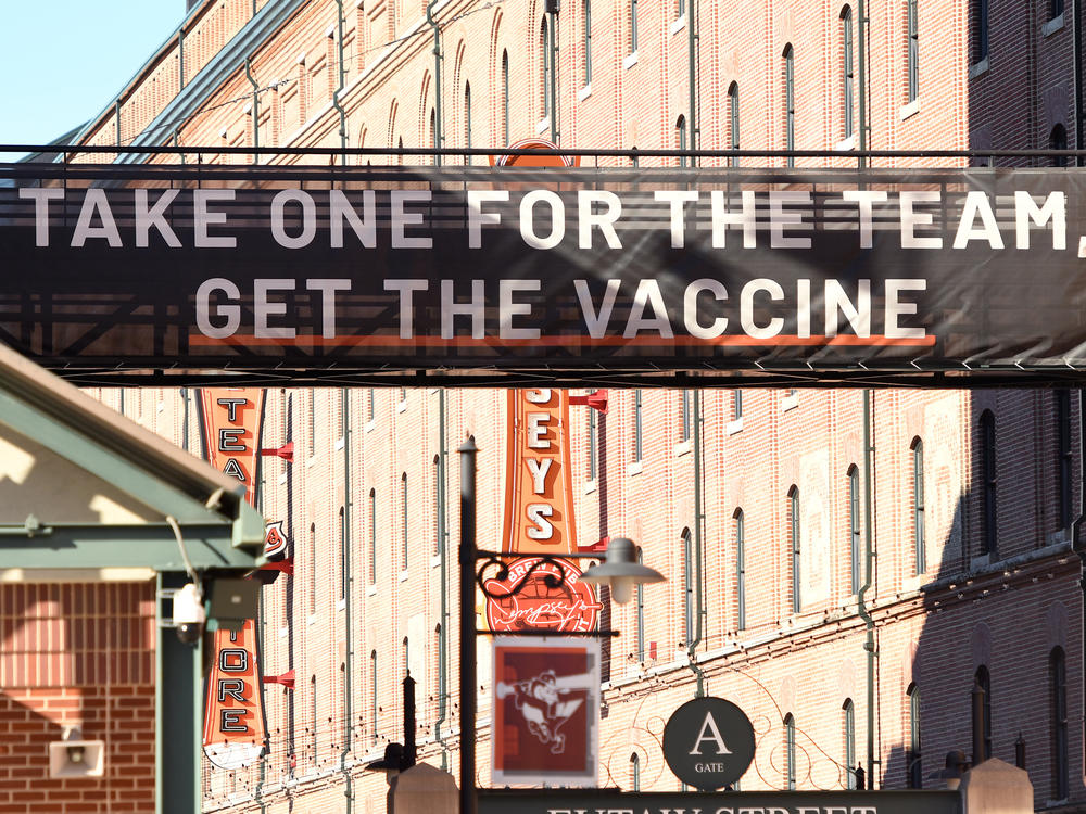 A sign outside Camden Yards in Baltimore, Maryland, encourages people to get a COVID-19 vaccine.