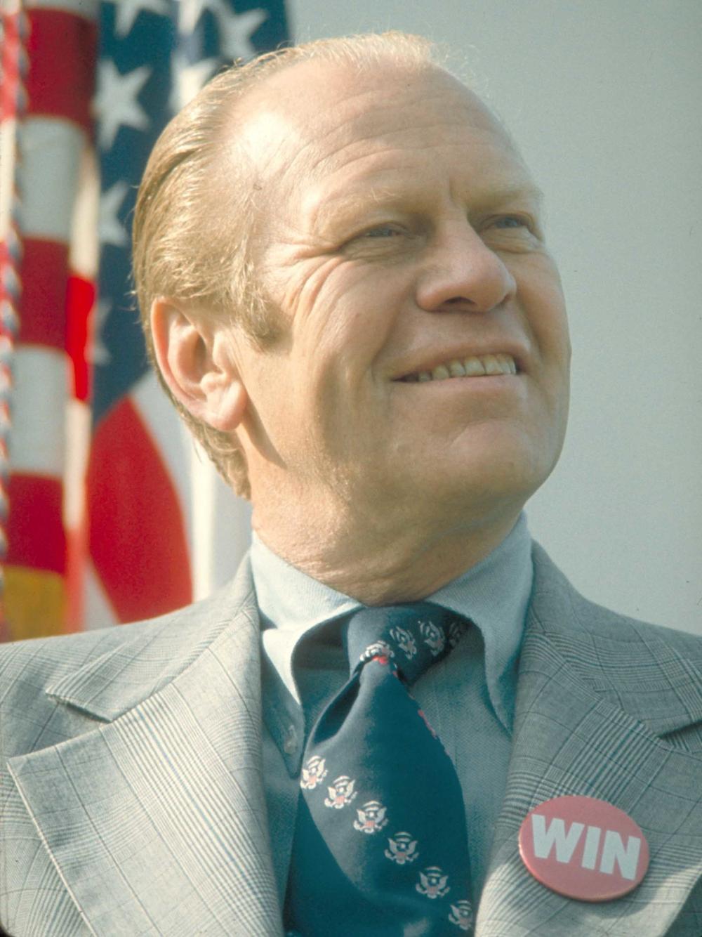 President Gerald Ford wearing a WIN (Whip Inflation Now) button on his lapel in 1974.