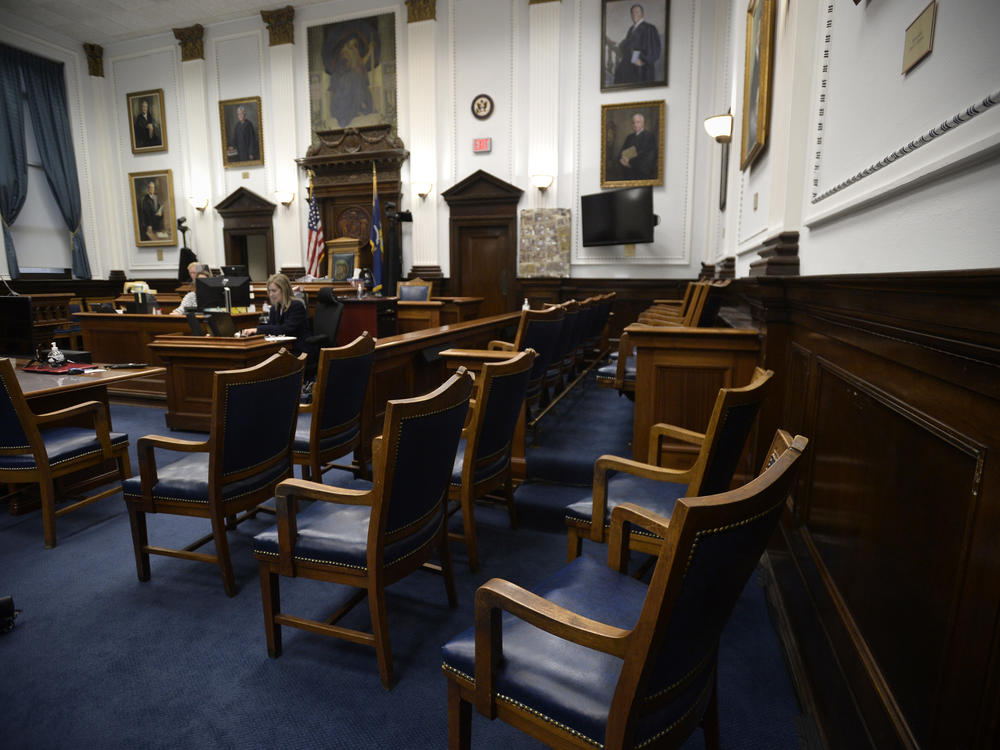 The jury box is empty in the ceremonial courtroom as the jury continues deliberations in private in the Kyle Rittenhouse trial at the Kenosha County Courthouse on Wednesday.