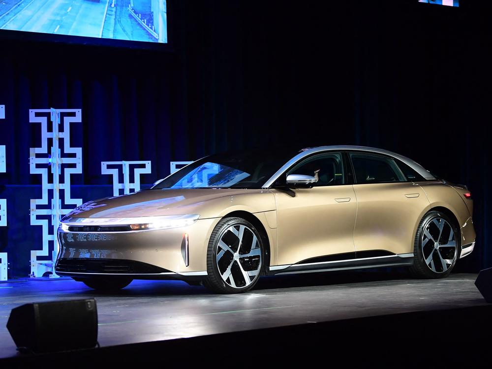 The Lucid Air takes the stage at the 2021 LA Autoshow on November 17, 2021. The luxury electric sedan won the 2022 Motortrend Car of the Year award this month.