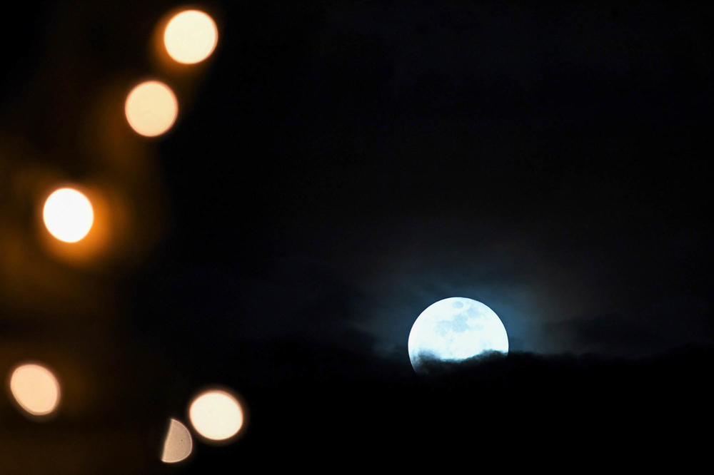The moon is seen during a lunar eclipse in Phnom Penh on Nov. 19.
