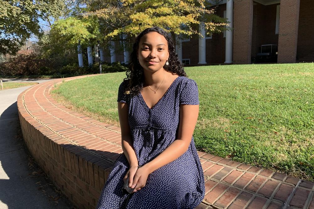 Jaiya McMillan, a Hollins junior, is vice president of the student government. The wishbone charm on her necklace is a totem of how lucky she feels to be at Hollins.