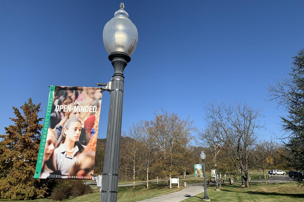 Banners on the Hollins University campus urge students to 
