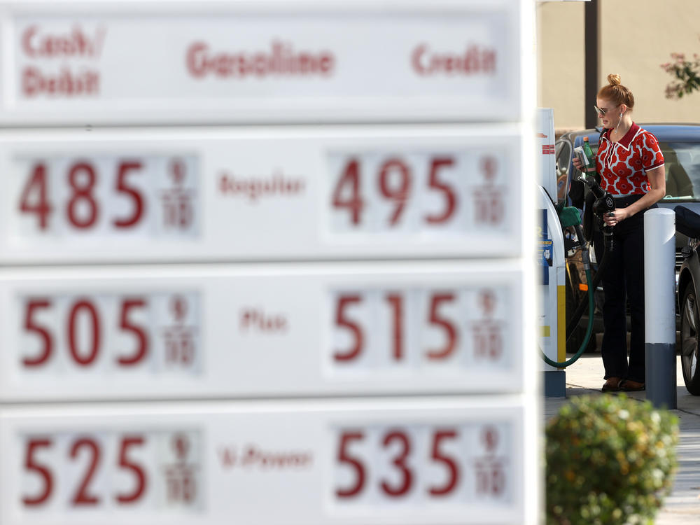 A customer prepares to pump gas into her car at a Shell station on Wednesday in San Rafael, Calif. A surge in gas prices this year is leaving the Biden administration looking for options to do something about it. One that's getting recent attention is tapping the country's emergency oil stockpile.