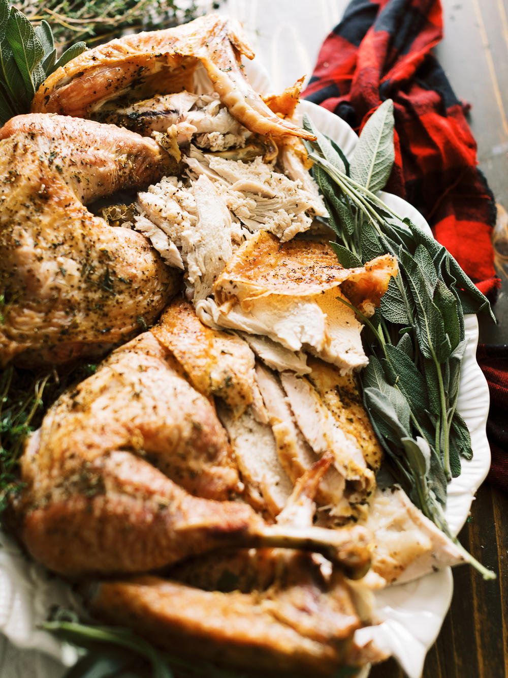Spatchcocked turkey, roasted to the right temperature results in properly cooked thighs and tender breasts.
