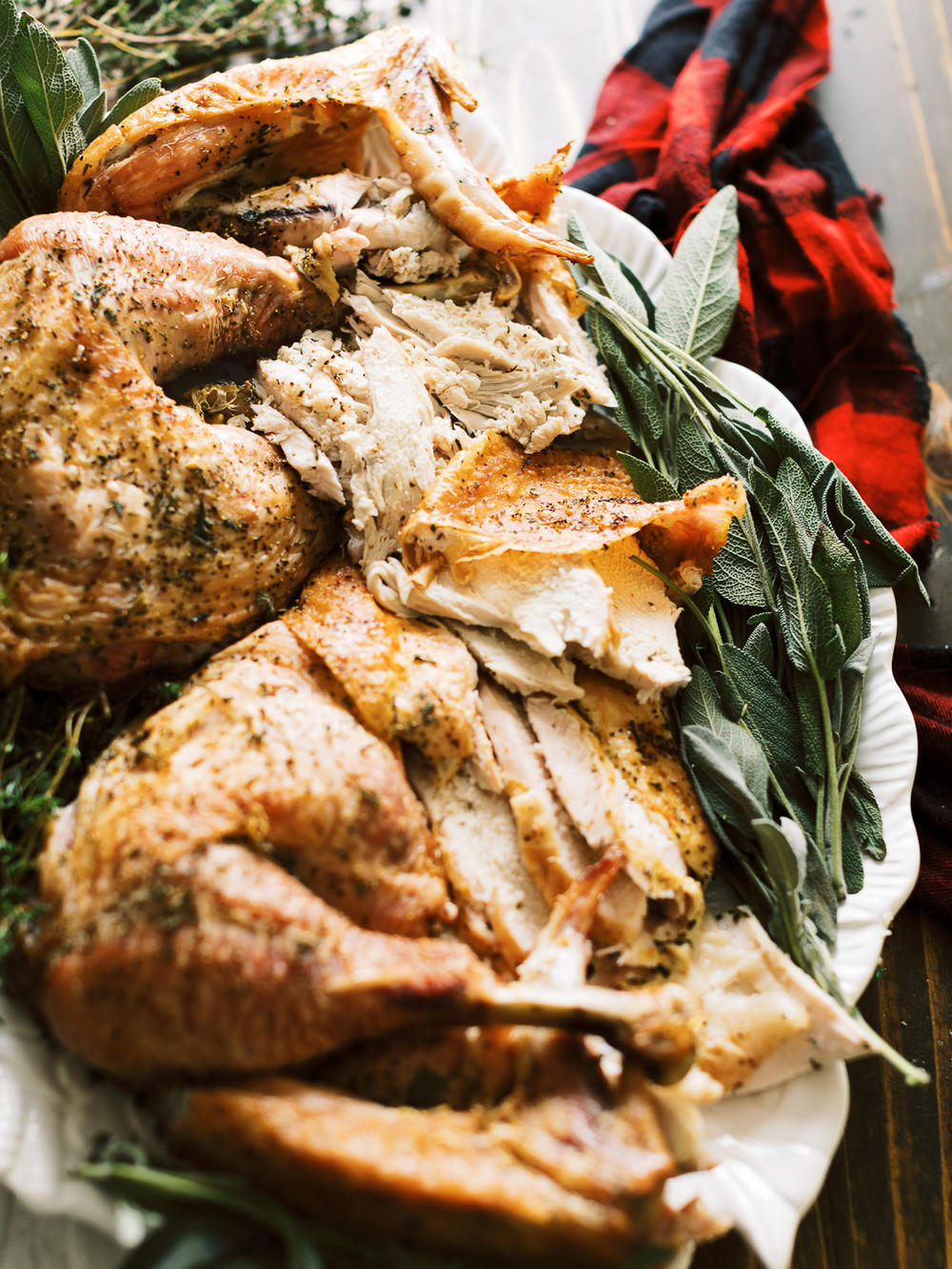 Spatchcocked turkey, roasted to the right temperature results in properly cooked thighs and tender breasts.