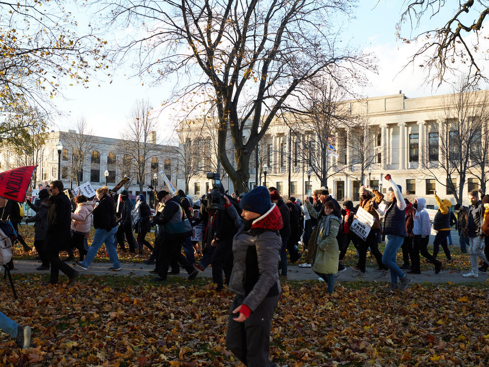 Protesters demonstrate against the Kyle Rittenhouse verdict at Civic Center Park in Kenosha, Wis., on Sunday.