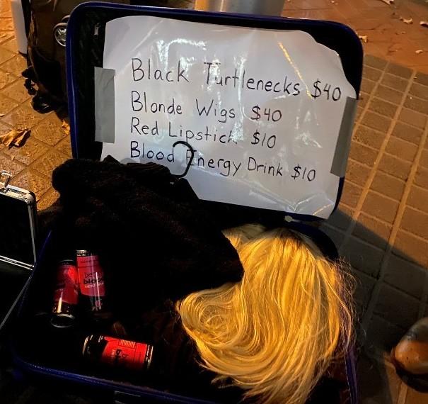 Some spectators at the trial of Elizabeth Holmes brought Holmes-themes items to the courthouse that were 