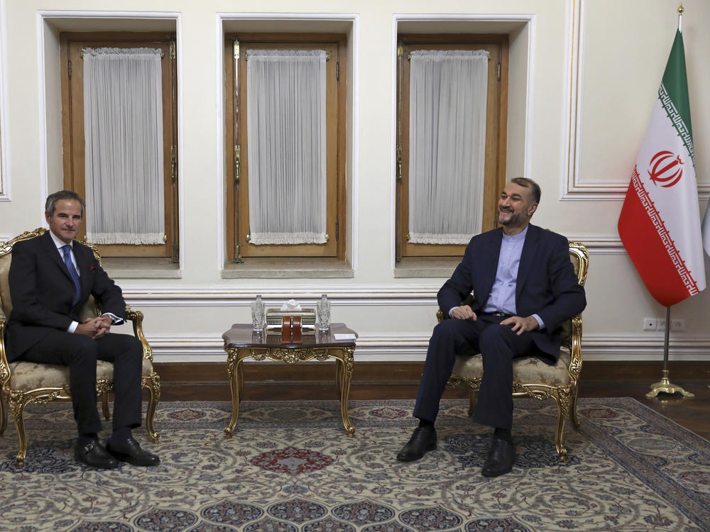 Head of the International Atomic Energy Agency Rafael Mariano Grossi, left, and Iranian Foreign Minister Hossein Amirabdollahian pictured meeting in Tehran, on Tuesday. Grossi pressed for greater access in the Islamic Republic ahead of diplomatic talks restarting over Tehran's tattered nuclear deal with world powers.