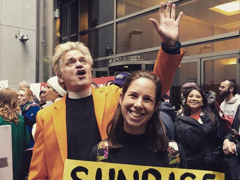 Reverend Billy (William Talen, left) among a flock of supporters.