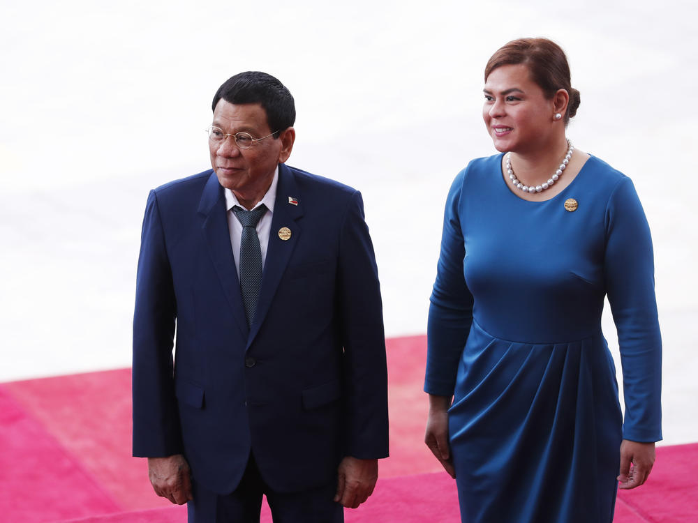 Philippine President Rodrigo Duterte and his daughter Sara Duterte arrive for the opening of the Boao Forum for Asia Annual Conference 2018.