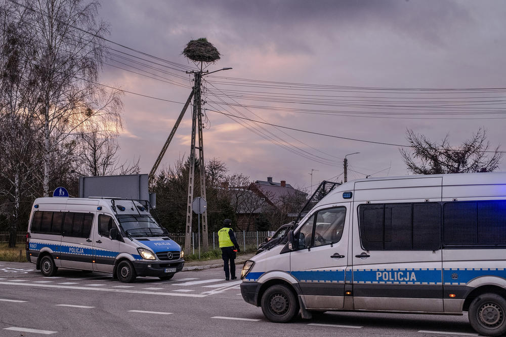 Police control cars looking for smugglers in Narew, near the Belarus-Poland border area.