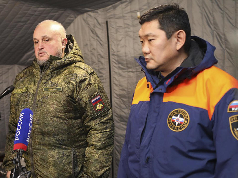 Kemerovo Governor Sergei Tsivilyov (center) speaks to the media in the Listvyazhnaya mine building, near Belovo, in the Kemerovo region of southwestern Siberia, Russia, Friday. A devastating explosion in the Siberian coal mine Thursday left dozens of miners and rescuers dead.