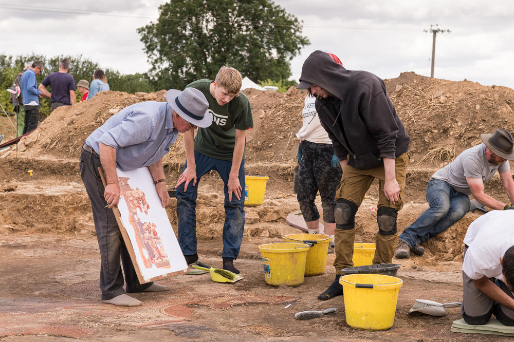 Rutland Villa Project. David Neal making notes on his illustration during the excavation of the mosaic.