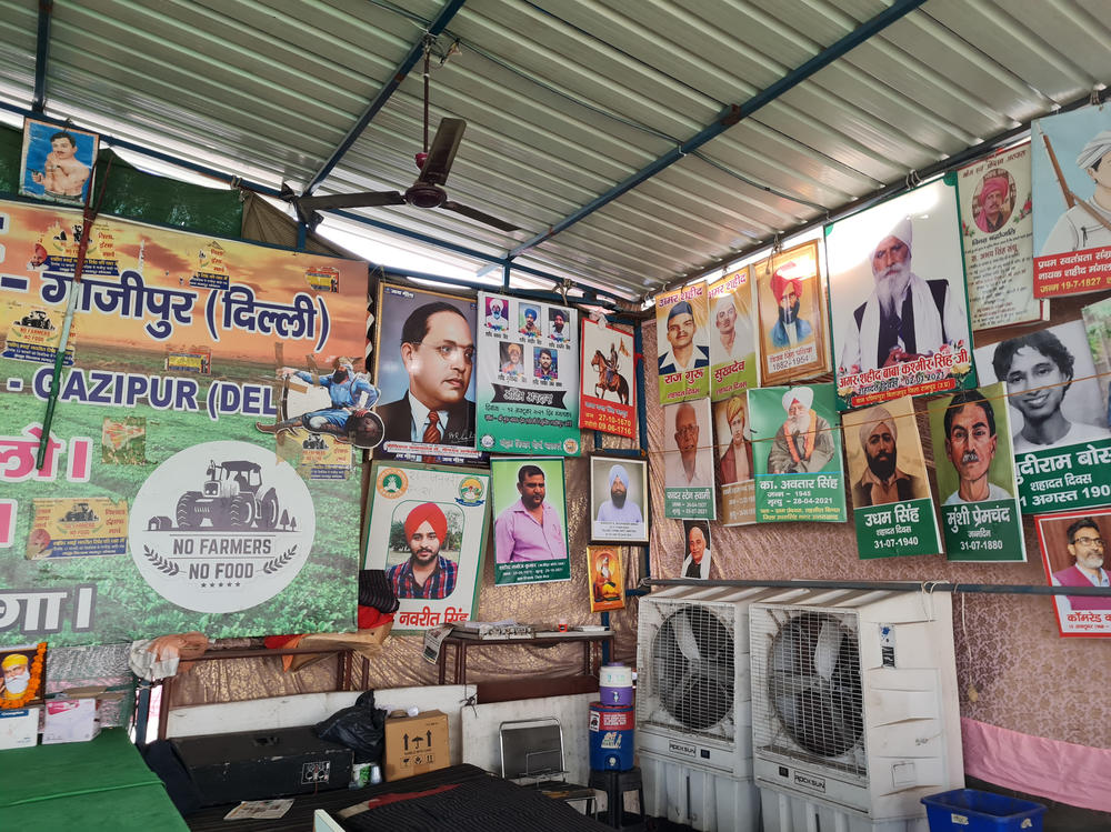 Portraits of famous Indian social reformers hang on the walls of an assembly tent in Ghazipur, eastern Delhi. The portraits include farmers during the struggle for India's independence, as well as B.R. Ambedkar, a Dalit scholar (formerly known as 