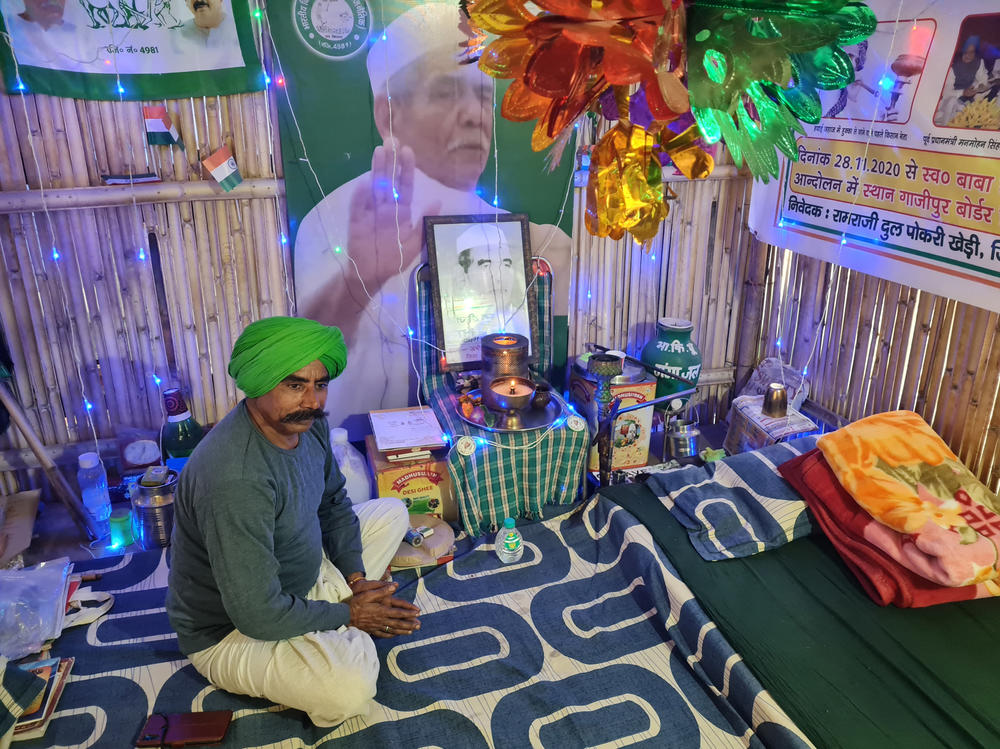 Ramkumar Pagdiwale, a sugarcane farmer from India's Uttar Pradesh state, has built a little shrine inside his bamboo tent at a protest camp erected in the middle of a highway on the eastern outskirts of India's capital.