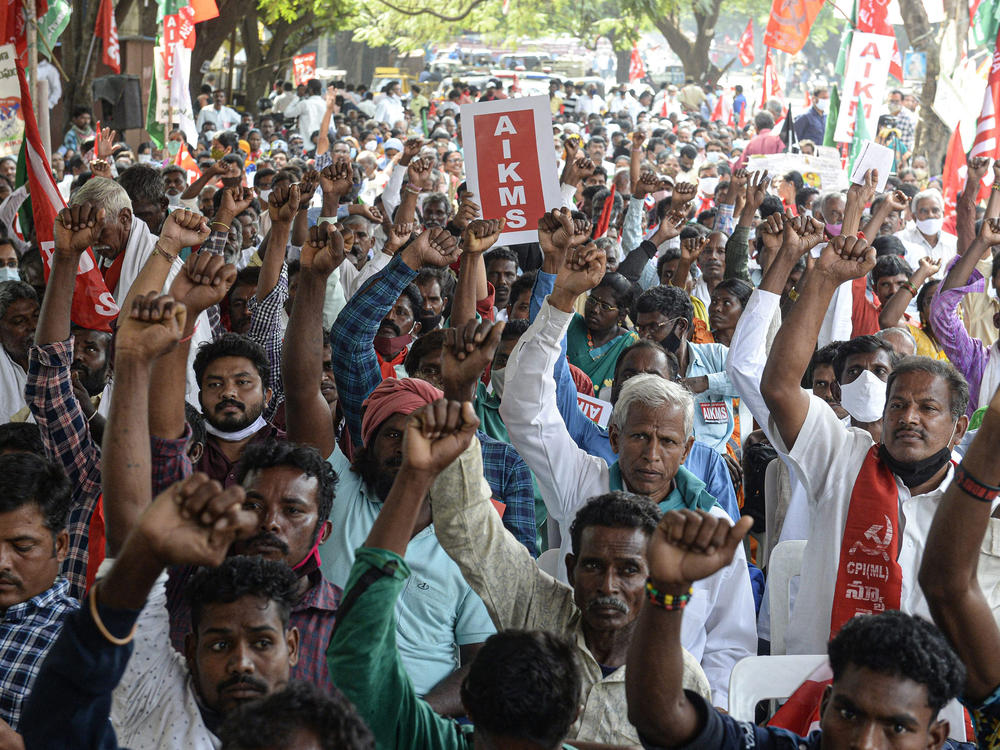 Supporters of All India Kisan Sangharsh Coordination Committee, a group of farmers' organizations, hold flags during a protest to mark one year since the introduction of divisive farm laws and to demand the withdrawal of the Electricity Amendment Bill, in Hyderabad, India, on Thursday.