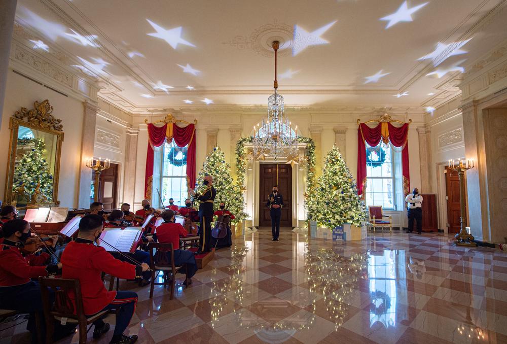 Members of the U.S. Marine Band play holiday music during a press tour of White House Christmas decorations on Nov. 29.