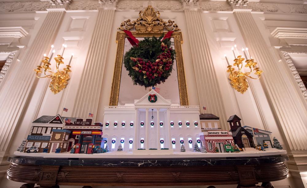 A gingerbread White House is seen in the State Dining Room during a press preview of the White House's holiday decorations on Nov. 29.