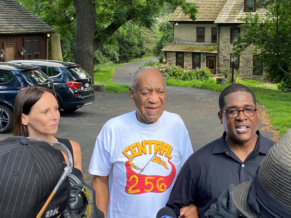 Attorney Jennifer Bonjean, Bill Cosby, and spokesperson Andrew Wyatt speaking outside of Cosby's suburban Philadelphia home in June, after the actor was released from prison.