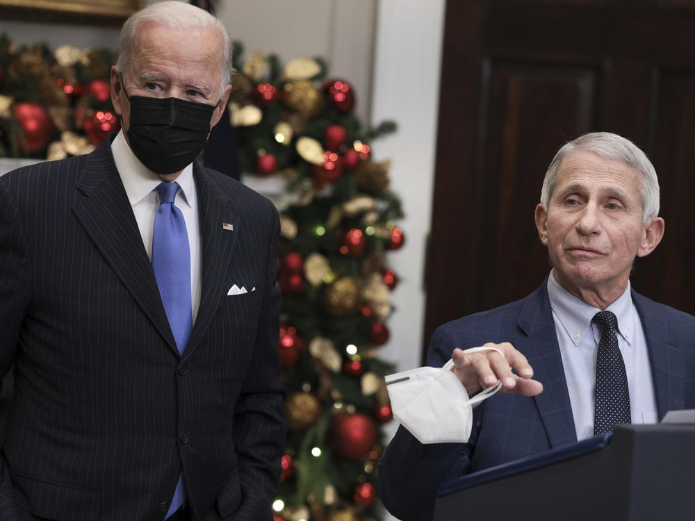 Anthony Fauci (right), director of the National Institute of Allergy and Infectious Diseases and chief medical adviser to the president, speaks alongside President Biden following a meeting of the COVID-19 response team at the White House on Monday.