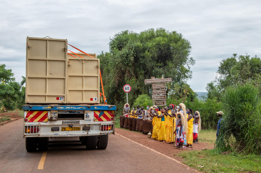 Locals celebrate the arrival of rhinos near Akagera National Park in Rwanda.